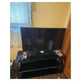 L G tv & stand, no power cord was found