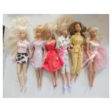 6 Barbie dolls