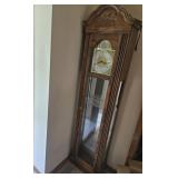 Howard Miller Grandfather Clock With Glass Shelves