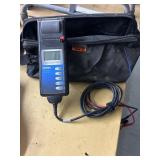 Electric battery tester by Midtronics