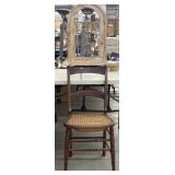 A single chair and wall decor