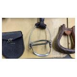 Two stirrups and a saddle bag