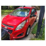 Red Chevy spark