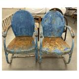Two vintage blue outdoor metal chairs