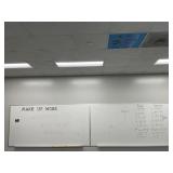 Two dry erase boards room 203