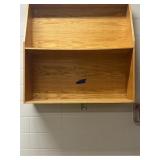 Wooden shelving unit upstairs