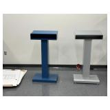 Two metal podiums located in RM 101