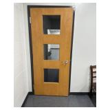 Door inside room number 303