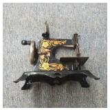 Antique toy sewing machine