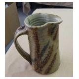 Pottery milk pitcher