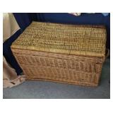 Wicker chest, filled with gift wrap paper