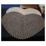 2 heart shaped wool braided rugs