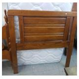 Twin headboard, box springs and mattress.