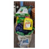 Potting soil, watering cans, fertilizer,  & Preen