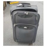 Gray Samsonite carry-on luggage