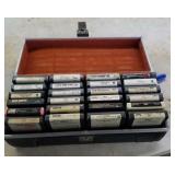 24 8-tracks and carrying case