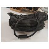 Leather duffel bag,  worn