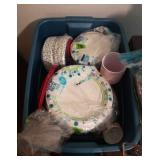 Tote of paper plates, cups, napkins, etc