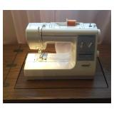 Kenmore sewing machine and cabinet