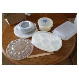 Storage containers,  mostly Tupperware