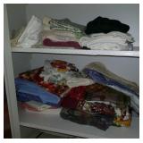 Tablecloths, towels, and storage box