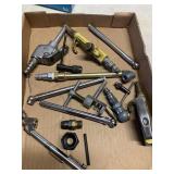 Air compressor attachments and tire gauges