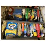 3 shelves full cleaning supplies