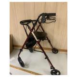 Walker with seat and storage bag