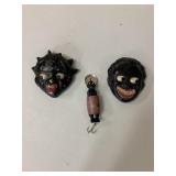 Black wall hangings and fishing lure