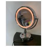 Electric lighted make-up mirror