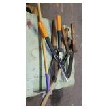 3 hedge trimmers, sledge, & child