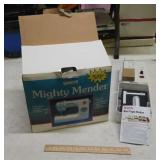 White Mighty Mender portable sewing machine