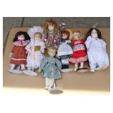 7 collectible porcelain dolls