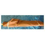 Bolt of mauve textured  upholstery fabric