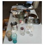 Kitchen items: pots, pans, dishes.