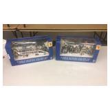 2- 8 piece lighted Christmas Village sets