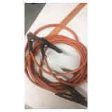 Extension cord, jumper cables, welding goggles