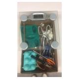 Kitchen utensils, glass bathroom scales