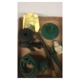 Outdoor light, drain unclogger