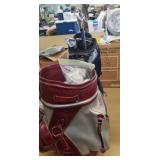 Golf bags, balls, child