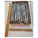 Flat silver peg hook holders