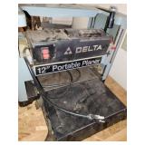12" Delta portable Planer with Homemade Cabniet.