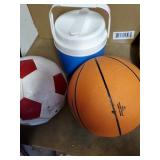 Basketball soccer ball , water jug