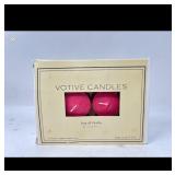 New 12pck of votive candles, cinnamon scented.