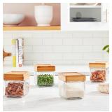 Case pack of 24 glass jars with wooden lids.