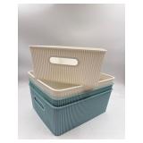 New (lot of 4) medium laundry bins. 2 white and 2