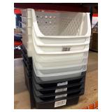 New stack of plastic organizer bins