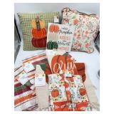 Variety lot of fall rugs, throw pillows, and hand