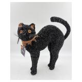 Decorative tinsel black cat.