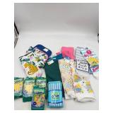Kitchen towels variety, oven mitts, and smart clea
